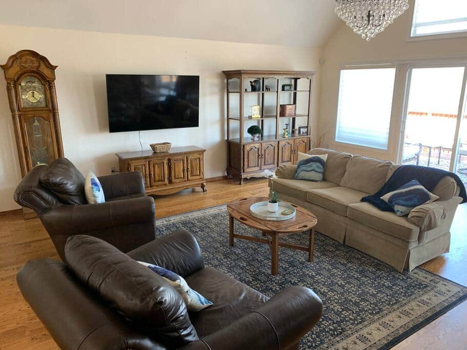 living room with view of couches and tv