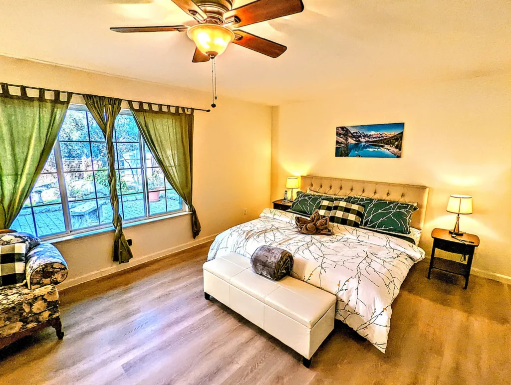 primary bedroom with couch seating area