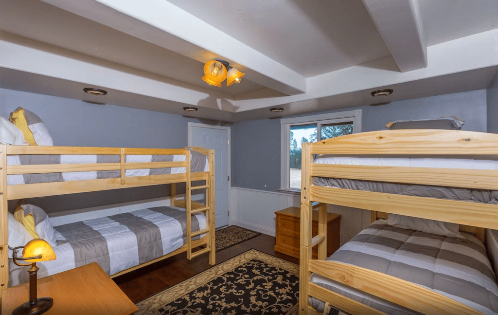 bedroom with two sets of bunkbeds