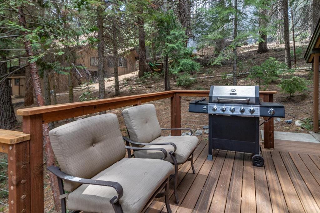 deck with grill and seating