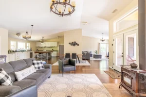 living area with seating and wood stove