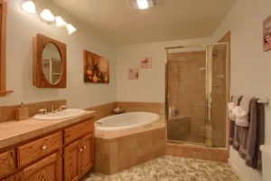 bathroom with spa tub and shower