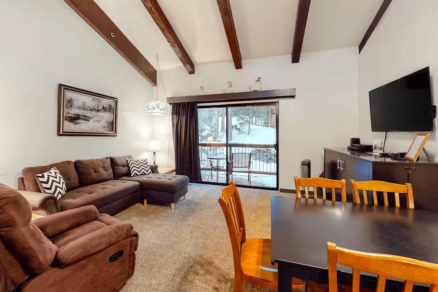 living area with pull out couches and television