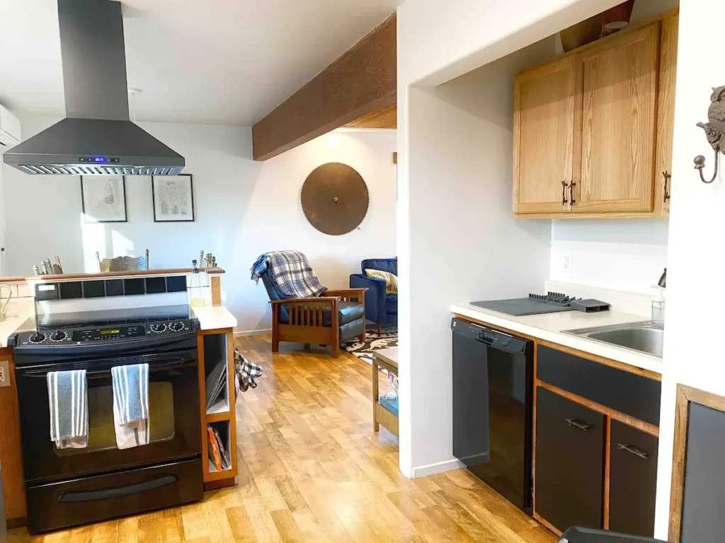 kitchen with black and wood cabinets