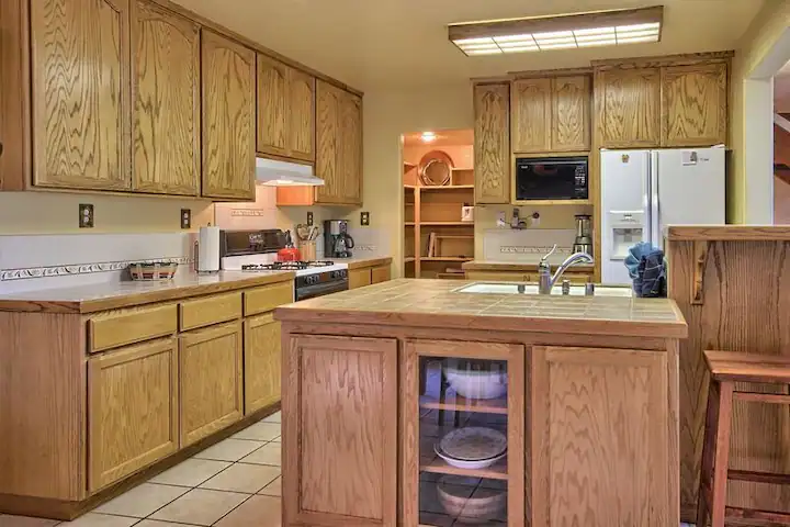 kitchen with wood cabinets and island
