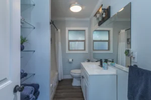 bathroom with shower tub and vanity