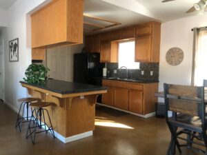 kitchen with island seating and wood cabinets