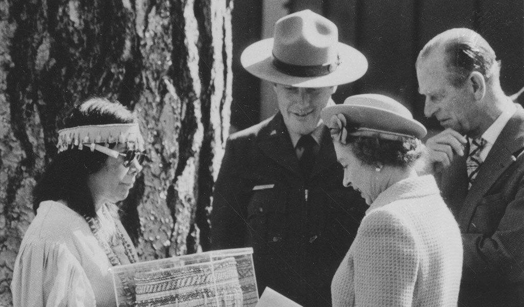 Julia Parker presents a basket to the UK's Queen Elizabeth