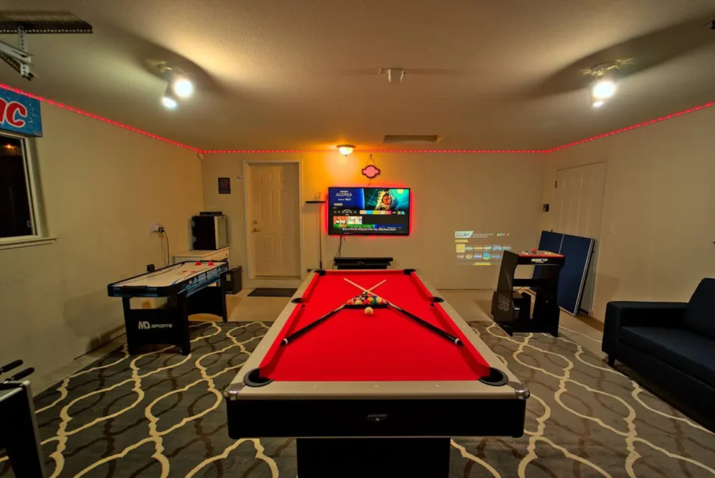 game room with pool table and games