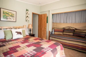 bedroom with queen bed and twin bed