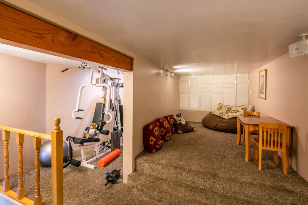 basement area with gym