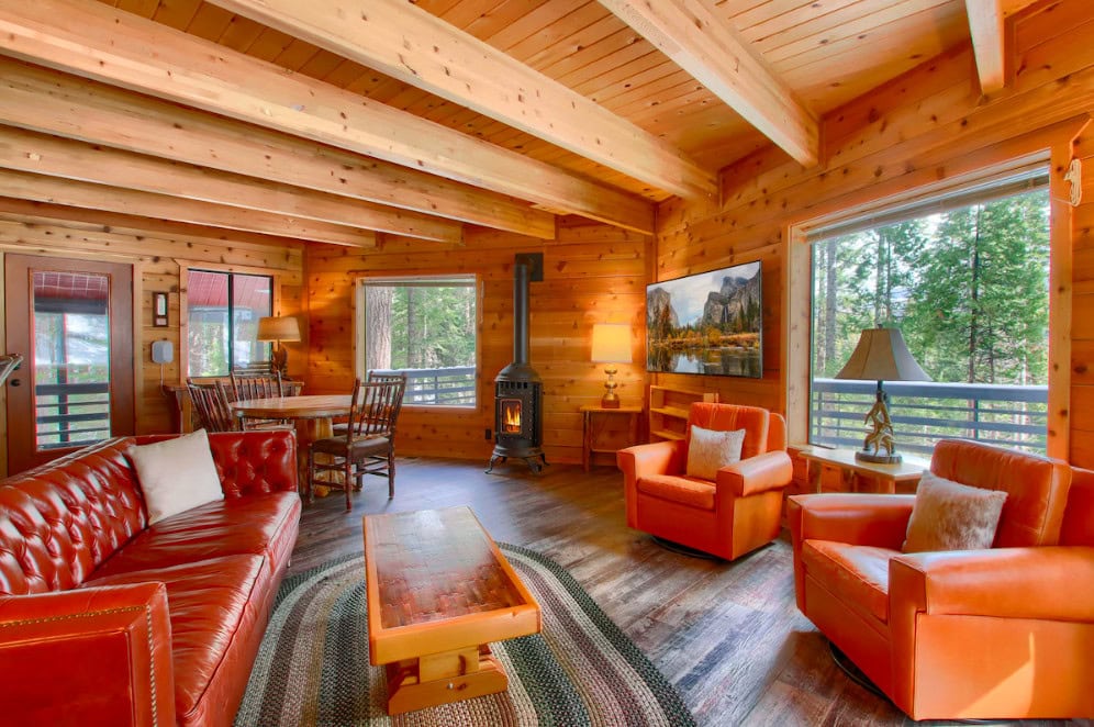 living area with fireplace, television, and seating