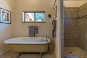 bathroom with shower and tub