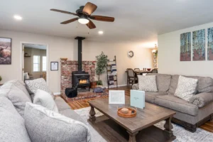 living room with wood stove and seating