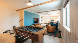 game room with foosball and entertainment center