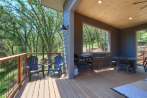 deck with outdoor seating and grill