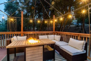 deck with outdoor seating and fire pit