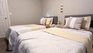 bedroom with two full beds