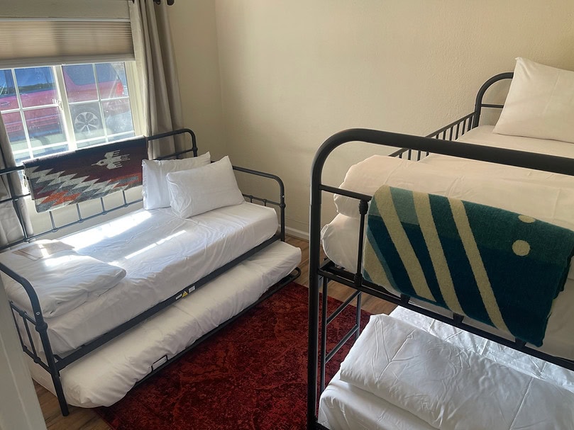 bedroom with trundle bed and bunk bed