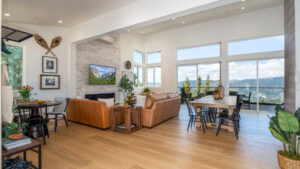 livign area with seating, television, and fireplace