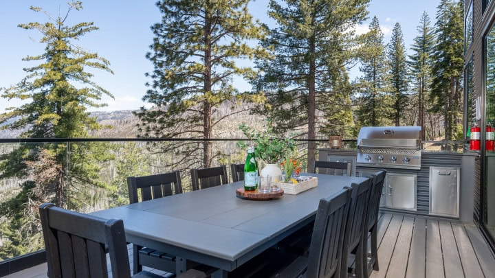 deck with outdoor seating and grill