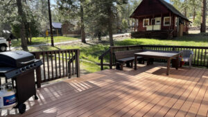 deck with outdoor seating and grill
