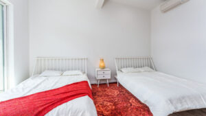 bedroom with two queen beds