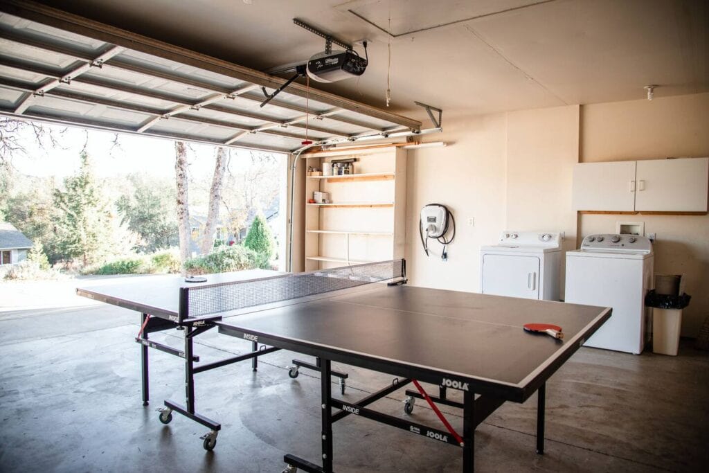 garge with ping pong table and EV charger