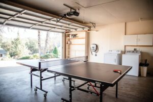 garge with ping pong table and EV charger