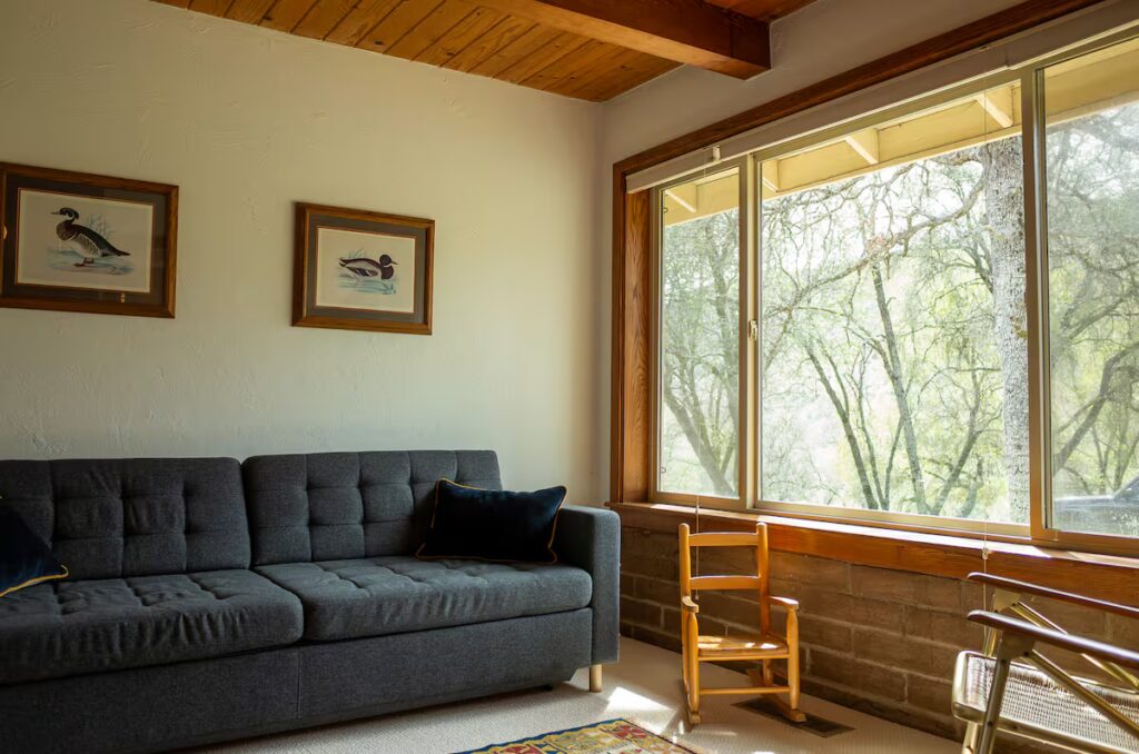 bedroom with queen pull out couch