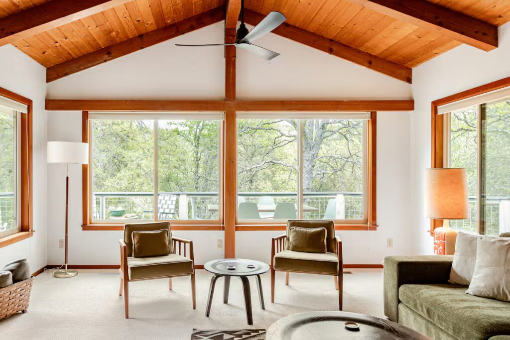 living room seating with large windows