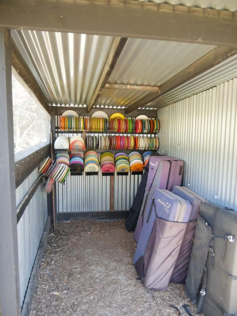 storage with rack of disc golf discs